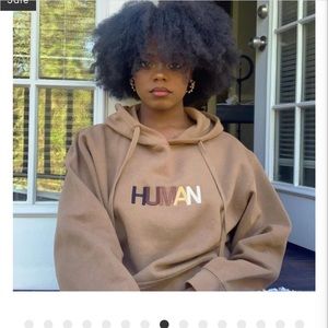 Brown Human Hoodie. XL unisex new. Never worn.